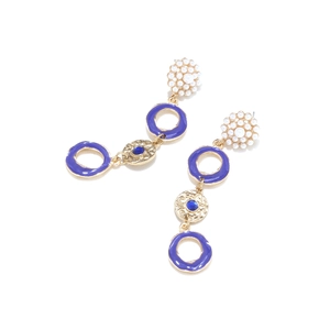 Detail view of long drop earrings with purple enamel rings and gold textured discs