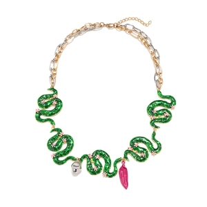 Chunky mixed-metal chain necklace with green enamel snakes and pink pepper charms