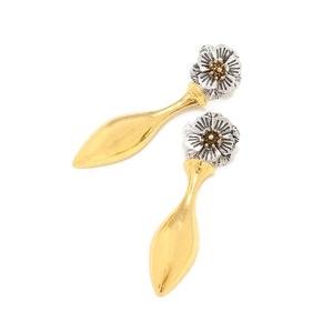 Detail of luxury alloy earrings featuring bicolor floral studs and golden teardrop pendants