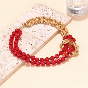 Vintage necklace with bold red beads and chunky gold metal chain in a mixed pattern