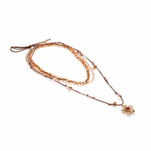 Multi-layer bohemian necklace with amber beads and gold pomegranate flower pendant