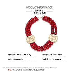 Detailed view of red resin beaded necklace with vintage alloy flower relief pendants