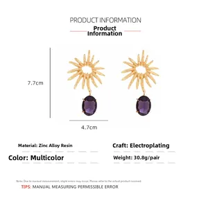 Detail view of large gold sunflower earrings with purple resin stones and size measurements