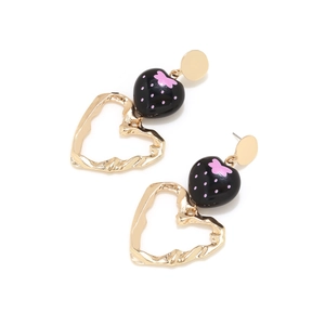 Long strawberry heart pendant earrings with gold openwork hearts on white background