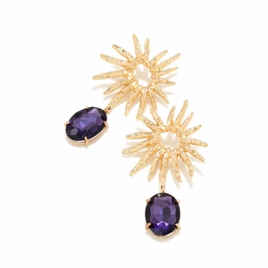 Detail of vintage gold sunflower earrings with large oval purple gemstone pendants