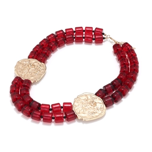 Double-layered beaded necklace with red resin beads and golden rose flower relief charms