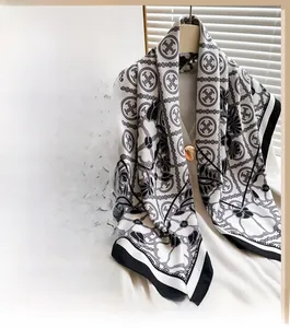 Detail of elegant 90cm square scarf featuring vintage floral patterns and smooth silk texture