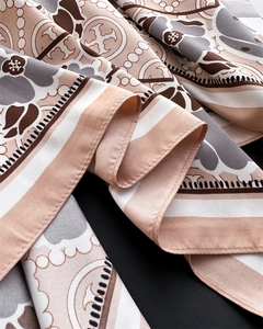 Macro detail of the twill texture and luxury floral patterns on this 90cm square scarf