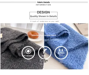 Detailed texture of thick knitted wool scarf showing gray and blue anti-pilling fabric