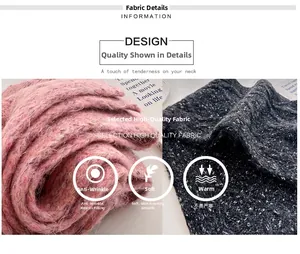 Close-up of pink and dark grey double-sided knitted wool scarves with fuzzy texture