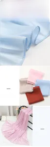 Detail showing 100% polyester scarf texture, fine edge stitching and vibrant color range