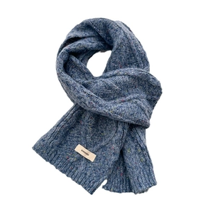 Chunky cable knit blue wool scarf with colorful fiber specks and brand label