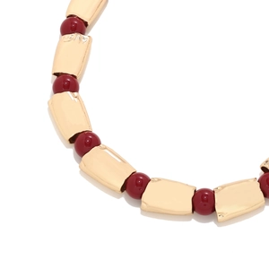 Handmade chunky choker necklace with gold curved beads and dark red spherical accents