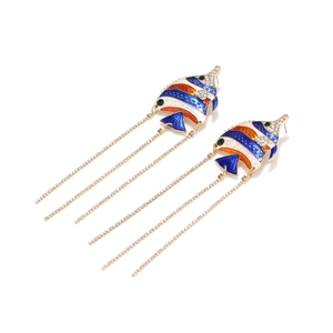 Detailed view of tropical fish drop earrings with colorful enamel and gold tassel chains