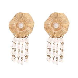 Golden flower earrings with pearl tassels and central pearl accent on white background