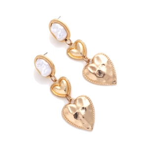 Long layered heart earrings with Baroque pearls and gold metal texture on white background