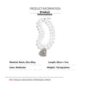 Détails du collier de perles multicouche avec pendentif coeur en résine et zinc