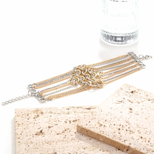 Luxurious multi-layer metal chain bracelet with gold and silver links in bohemian style