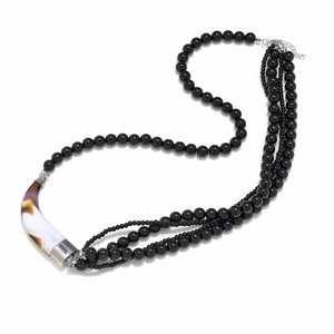 Handmade multi-layer black beaded necklace with a marble-textured horn pendant