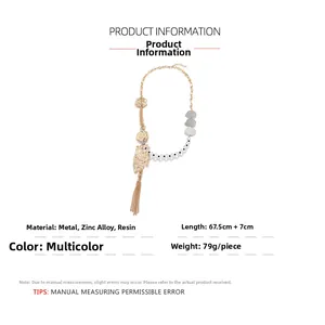 Détails du collier bohème avec perles, montrant la longueur de 67,5cm et le gland