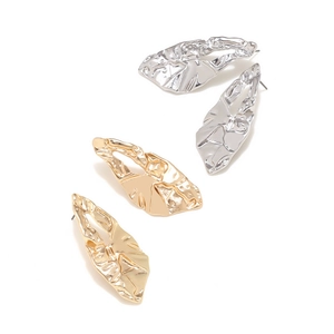 Chunky gold and silver irregular textured earrings with artistic crumpled leaf design