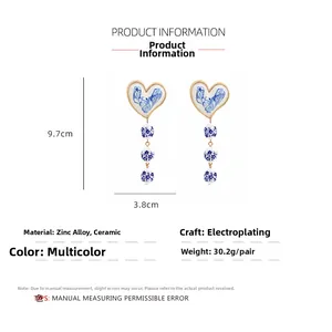 Detailed view of blue floral heart earrings with size 9.7x3.8cm and 30.2g weight specs
