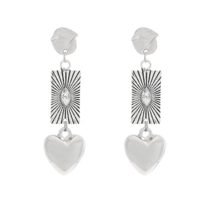 Vintage silver tiered earrings featuring sunburst pendants and 3D heart charms