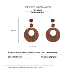 Détails de boucles d'oreilles rétro en bois géométrique avec mesures de taille