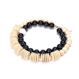 Handmade geometric wooden bead necklace with black resin beads and adjustable gold chain