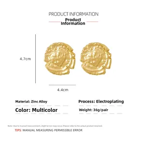 Macro detail of gold vintage coin earrings showing 4.7cm size and zinc alloy texture
