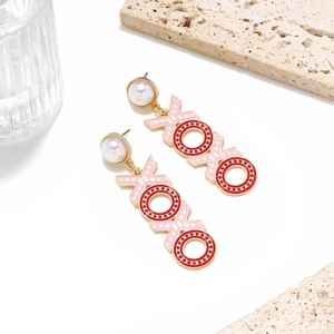 Chic XOXO letter drop earrings with pink and red enamel dots and white pearls