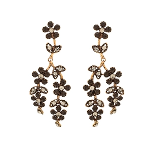 Vintage long hollow floral drop earrings with rhinestones in gold metal finish