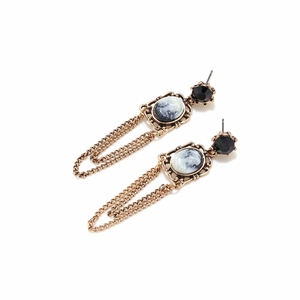 Vintage gold court style cameo earrings with black gemstones and long fringe tassels