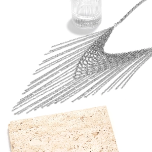 Luxurious multi-strand tassel pendant necklace with layered silver metal chains