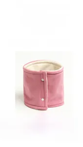 Detailed view of pink double-layer fleece neck warmer with white resin snap buttons