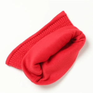 Close-up of red knit neck warmer featuring thick ribbed texture and warm fleece lining