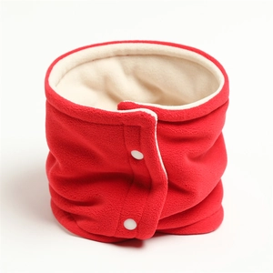 Detail of red fleece winter neck warmer with white snap buttons and thick thermal lining