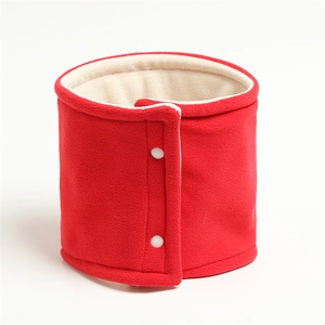 Close-up of red fleece neck warmer with white fur lining and snap button closure