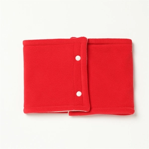 Macro view of double-layer red fleece neck warmer with white snap button closure detail