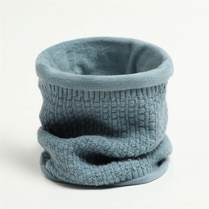 Detailed view of grey-blue knit waffle texture with warm faux shearling lining