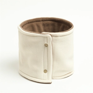 Detailed view of winter neck warmer with beige fleece exterior and brown lining with snaps