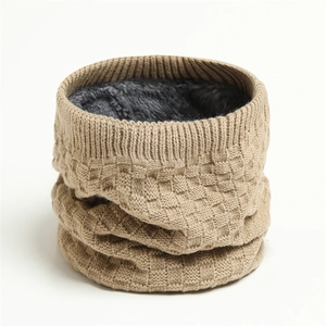 Close-up of khaki waffle knit winter neck warmer featuring soft black fleece lining