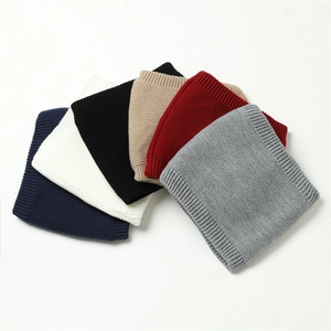 Detail showing various colors and thick ribbed texture of thermal knitted neck warmers