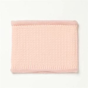 Detail of pink waffle knit snood with soft faux fur trim and cozy thermal texture