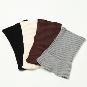 Detailed view of elastic ribbed knit neck warmers in black, cream, brown, and grey
