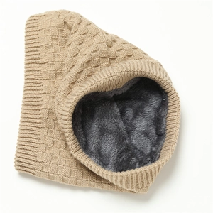 Close-up of winter knit neck warmer with khaki waffle texture and soft grey plush lining