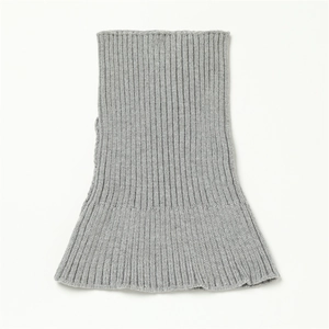 Detail view of grey knit neck warmer with vertical ribbing and elastic texture design