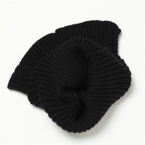 Close-up of black ribbed knit neck warmer showing detailed elastic texture and warm fabric