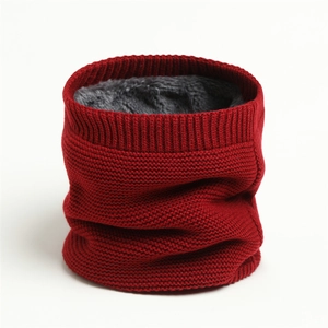 Close-up of winter knit neck warmer with thick grey fleece lining in burgundy red