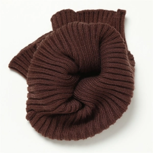 Close-up of deep coffee knit neck gaiter showing detailed thick vertical ribbed texture